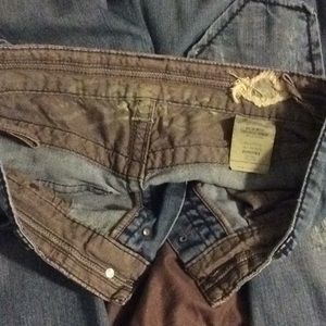 Stitch's Bootcut Distressed Jeans